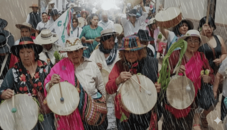 Las comadres van a festejar con paraguas en mano